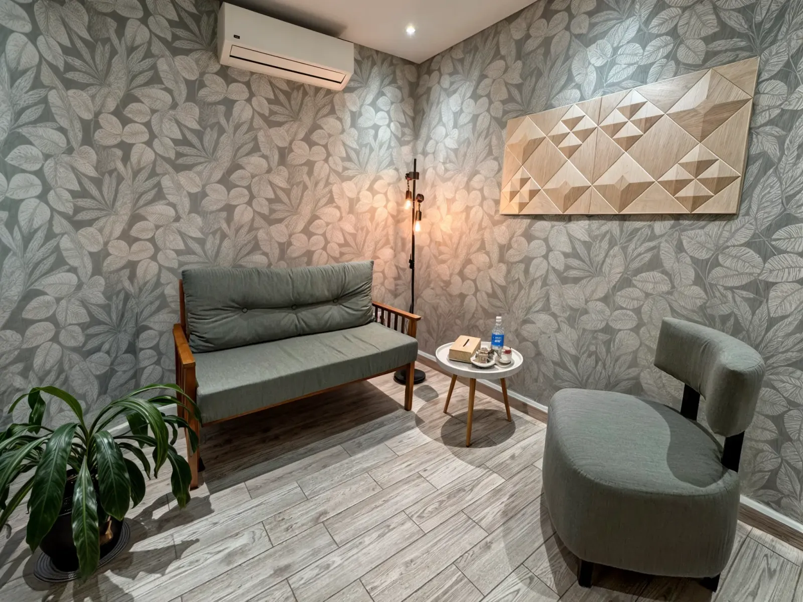 a living room with a couch and a chair