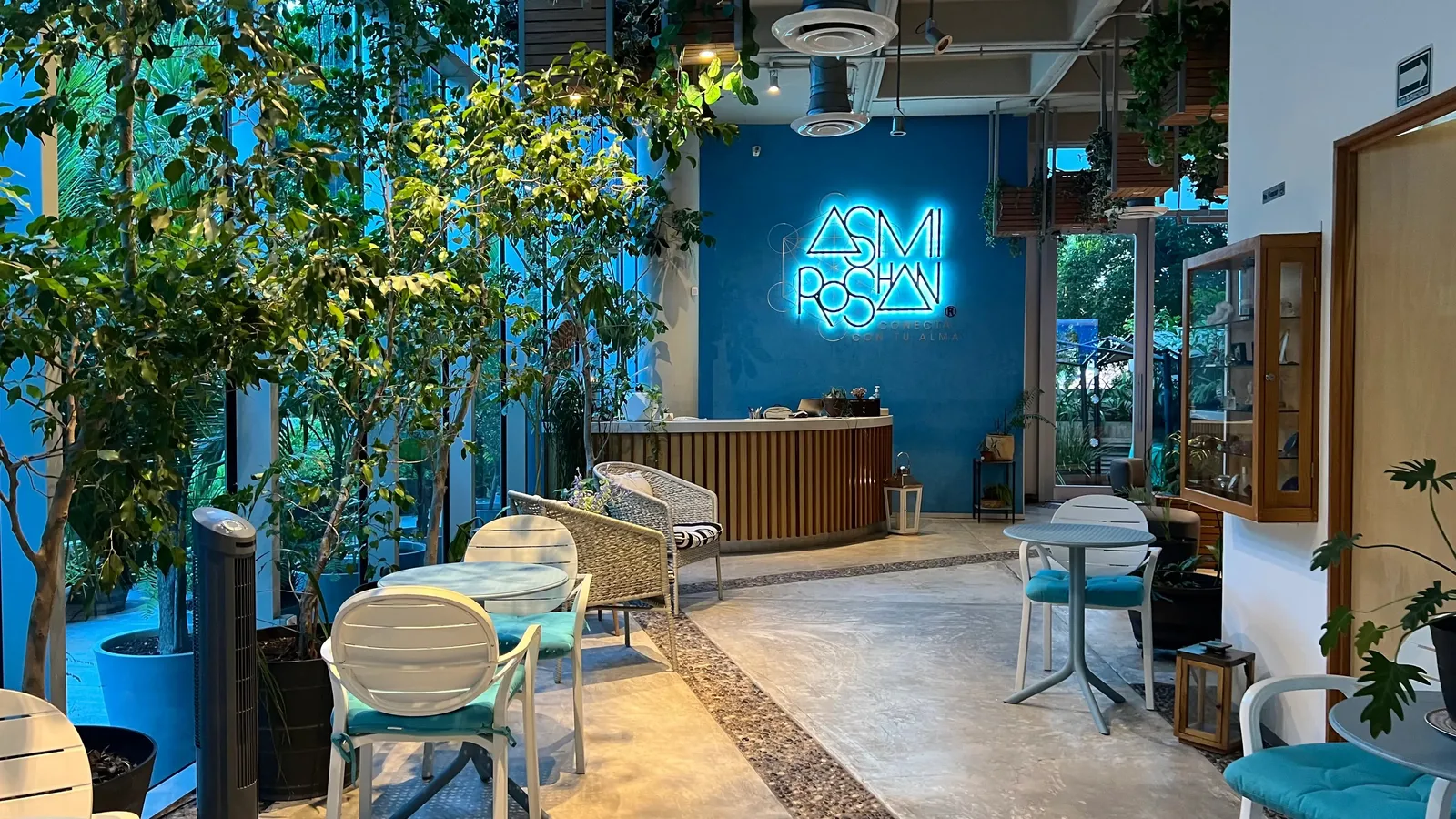 a restaurant with a neon sign that says,'a neon sign that says a
