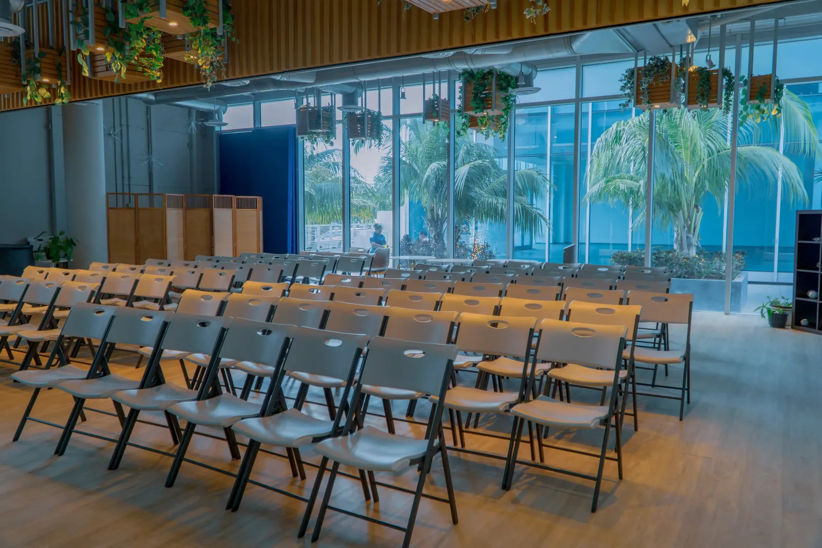 a room with chairs and tables and chairs
