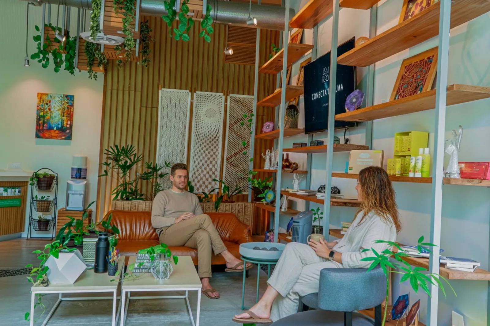 a man and woman sitting in a room
