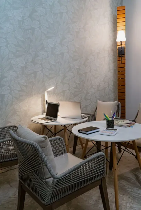 a table with a laptop and a laptop on it